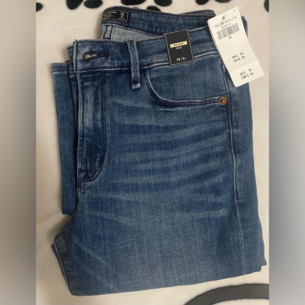 Mid Rise Boot Cut, 28/6 Reg rise, Medium wash